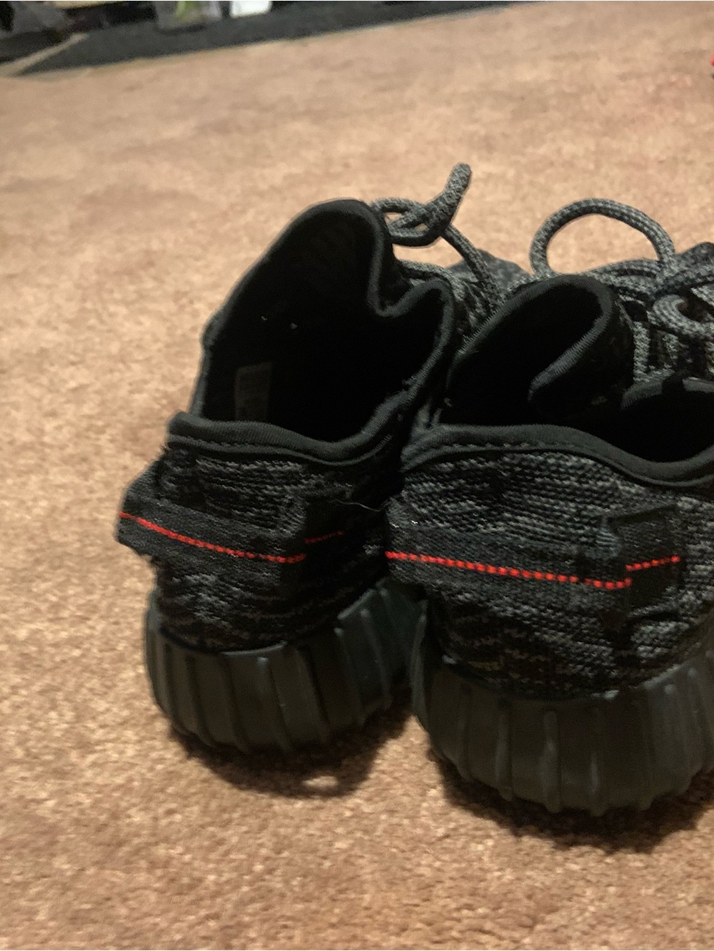 adidas - Yeezy Black Knit Low-Top Lace-Up Sneakers - Picture 3 of 10
